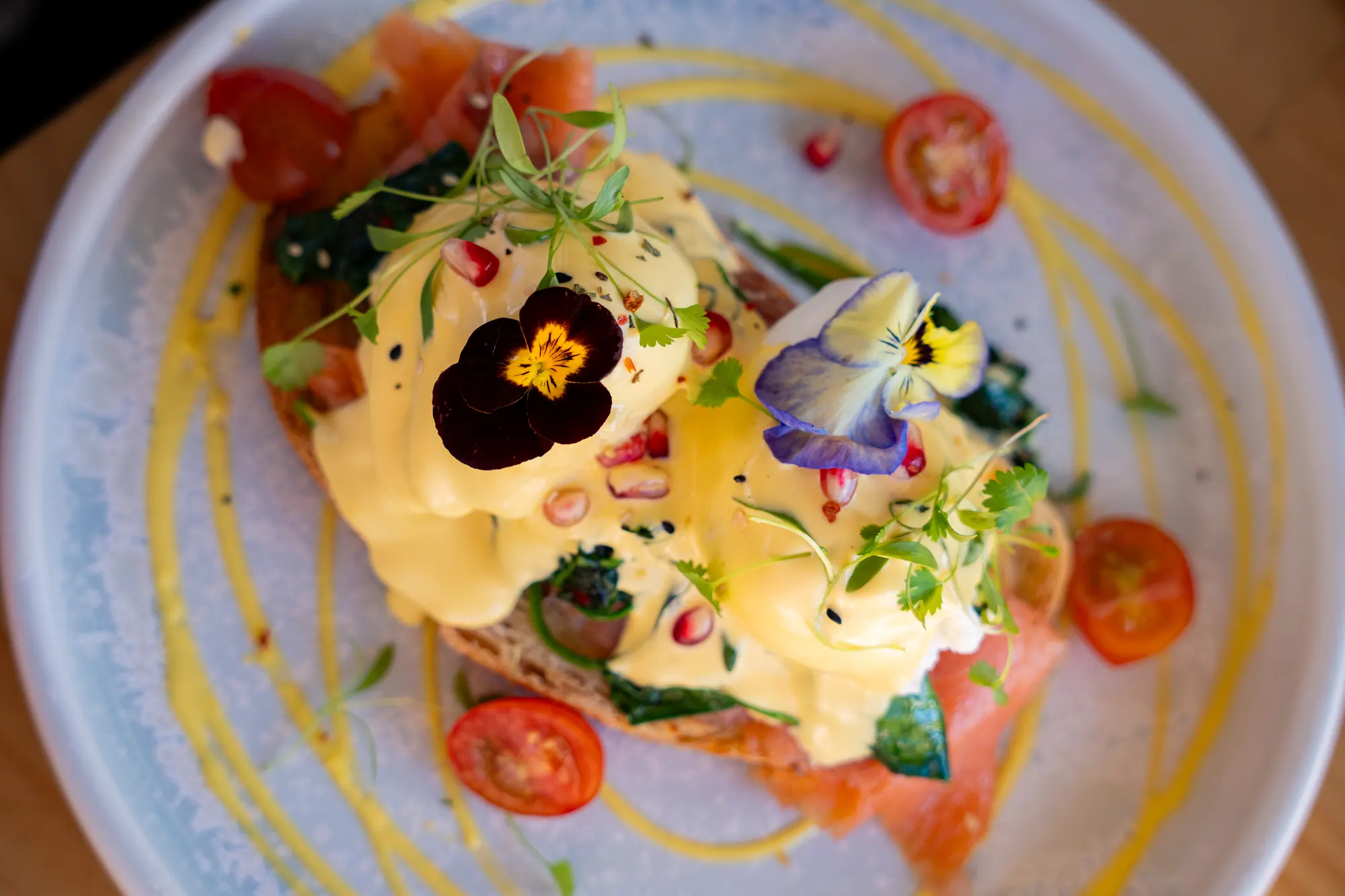 Brunch plate with edible flowers at Bud Cafe